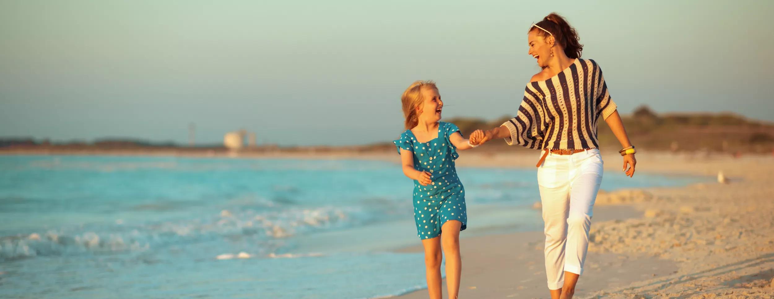 Schroders Investment Managers - woman and daughter beach